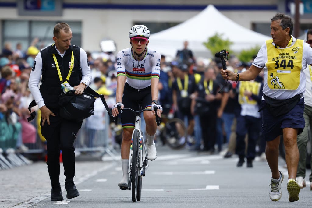 epa12220705 Slovenian rider Tadej Pogacar of UAE Team Emirates team reacts after the 2nd stage of the Tour de France cycling race over 209.1km from Lauwin-Planque to Boulogne-sur-Mer, France, 06 July 2025.  EPA/MARTIN DIVISEK