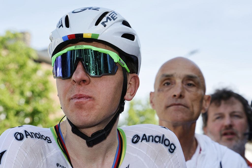 Slovenia's Tadej Pogacar of the UAE Team Emirates URG team after crossing the finish line to win the Belgian cycling classic and UCI World Tour race Liege Bastogne Liege, in Liege, Belgium, Sunday, April 27, 2025. (AP Photo/Geert Vanden Wijngaert)